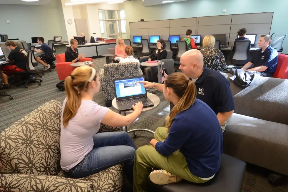 Students receive computer training from IT staff
